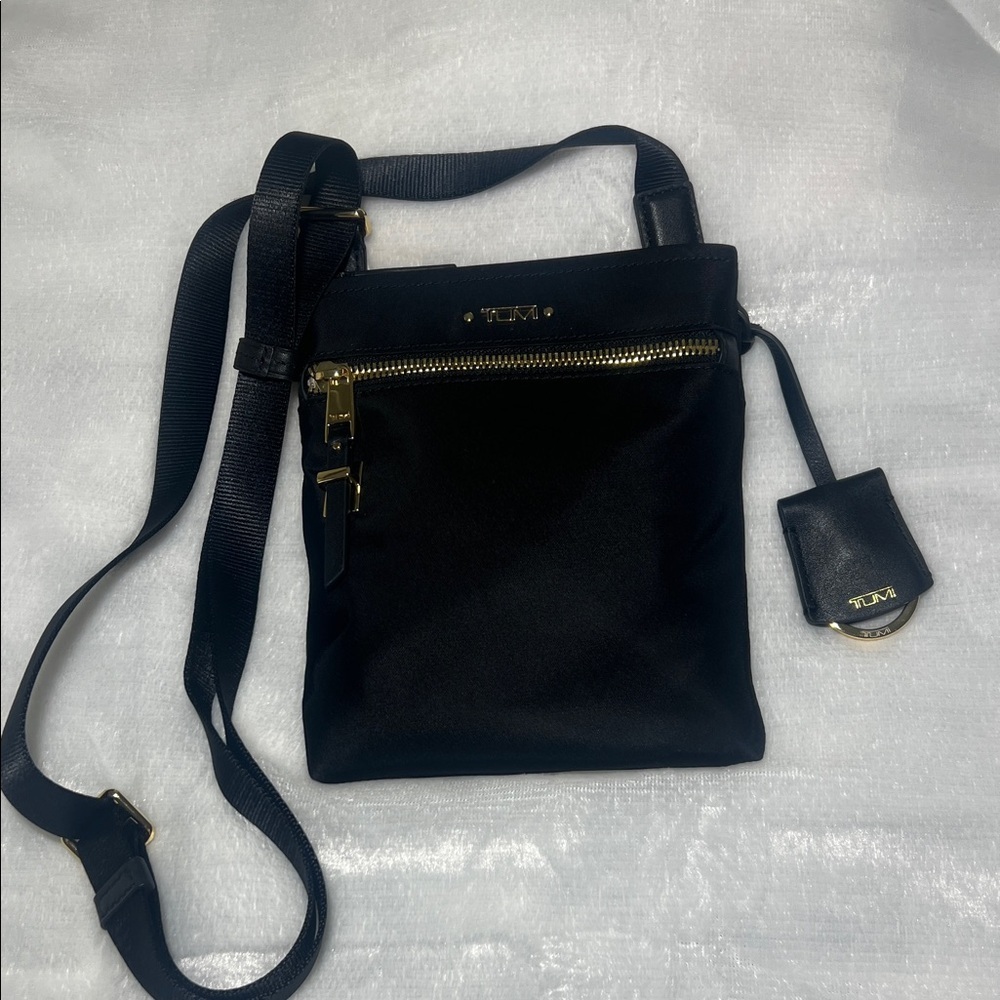 Tumi Black and Gold Crossbody Bag
